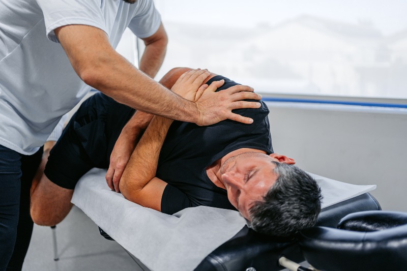 Chiropractic adjustment session for back pain relief in Sandusky, OH