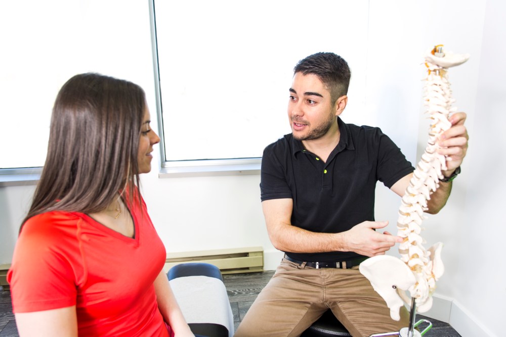 Scoliosis treatment consultation using spine model in Sandusky, OH